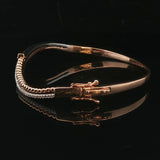 14k Rose and White Gold and 0.50cttw Diamond Curved Bypass Bangle Bracelet 6.75"