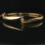 14k Yellow Gold and 0.25ct Bezel Set Diamond Bypass Bangle Bracelet 7"