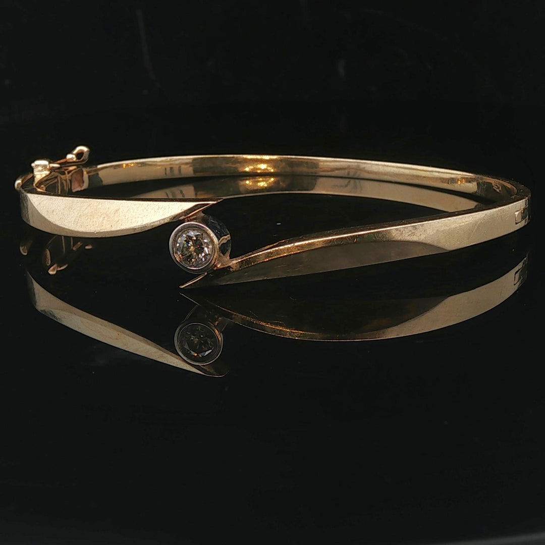 14k Yellow Gold and 0.25ct Bezel Set Diamond Bypass Bangle Bracelet 7"