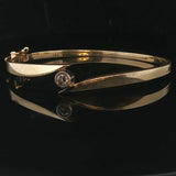 14k Yellow Gold and 0.25ct Bezel Set Diamond Bypass Bangle Bracelet 7"