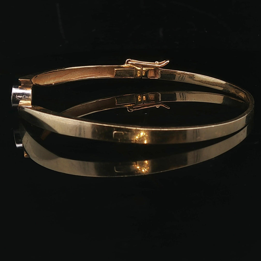 14k Yellow Gold and 0.25ct Bezel Set Diamond Bypass Bangle Bracelet 7"
