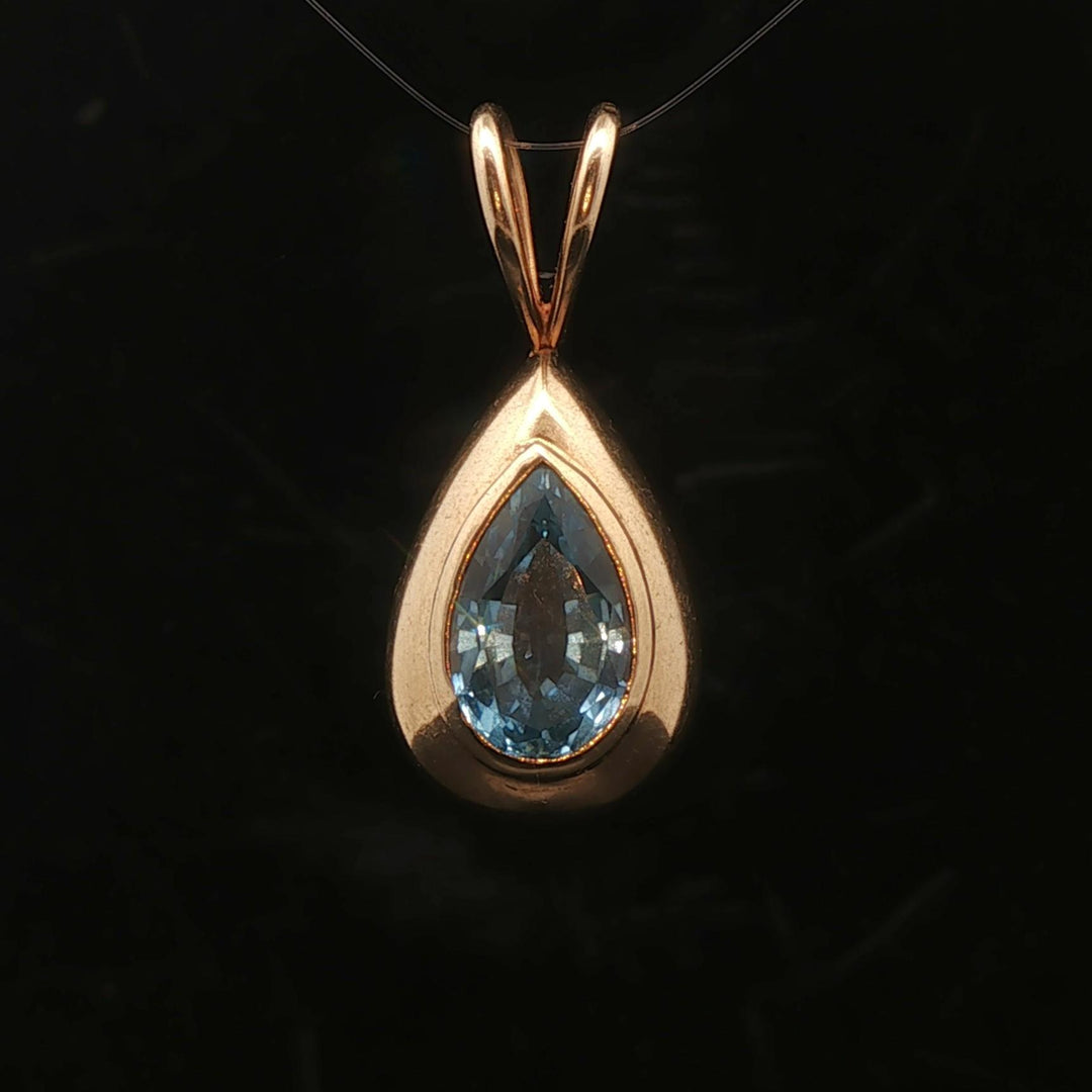 14k Yellow Gold and Pear Cut Blue Topaz 5.2g Pendant 1.2"