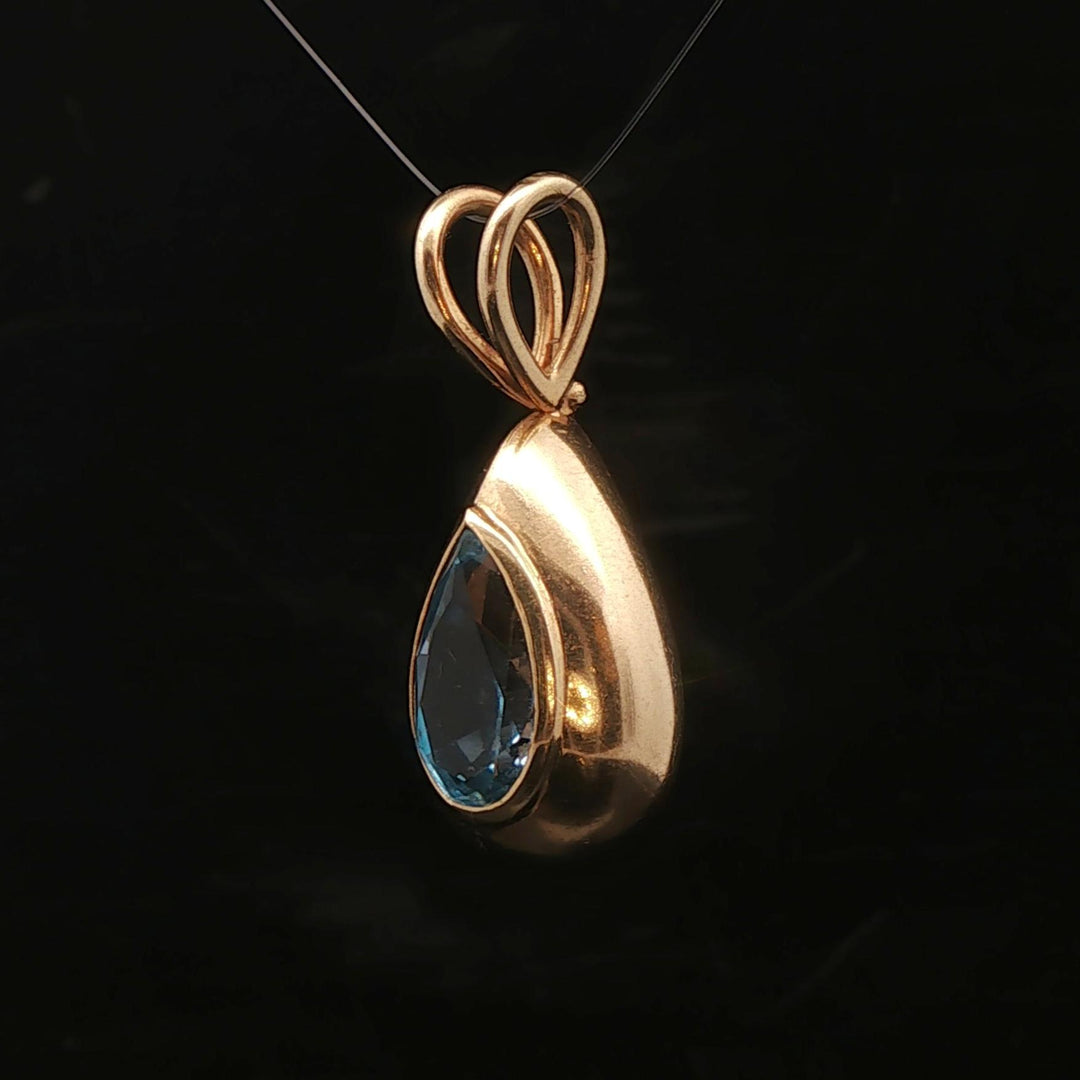 14k Yellow Gold and Pear Cut Blue Topaz 5.2g Pendant 1.2"