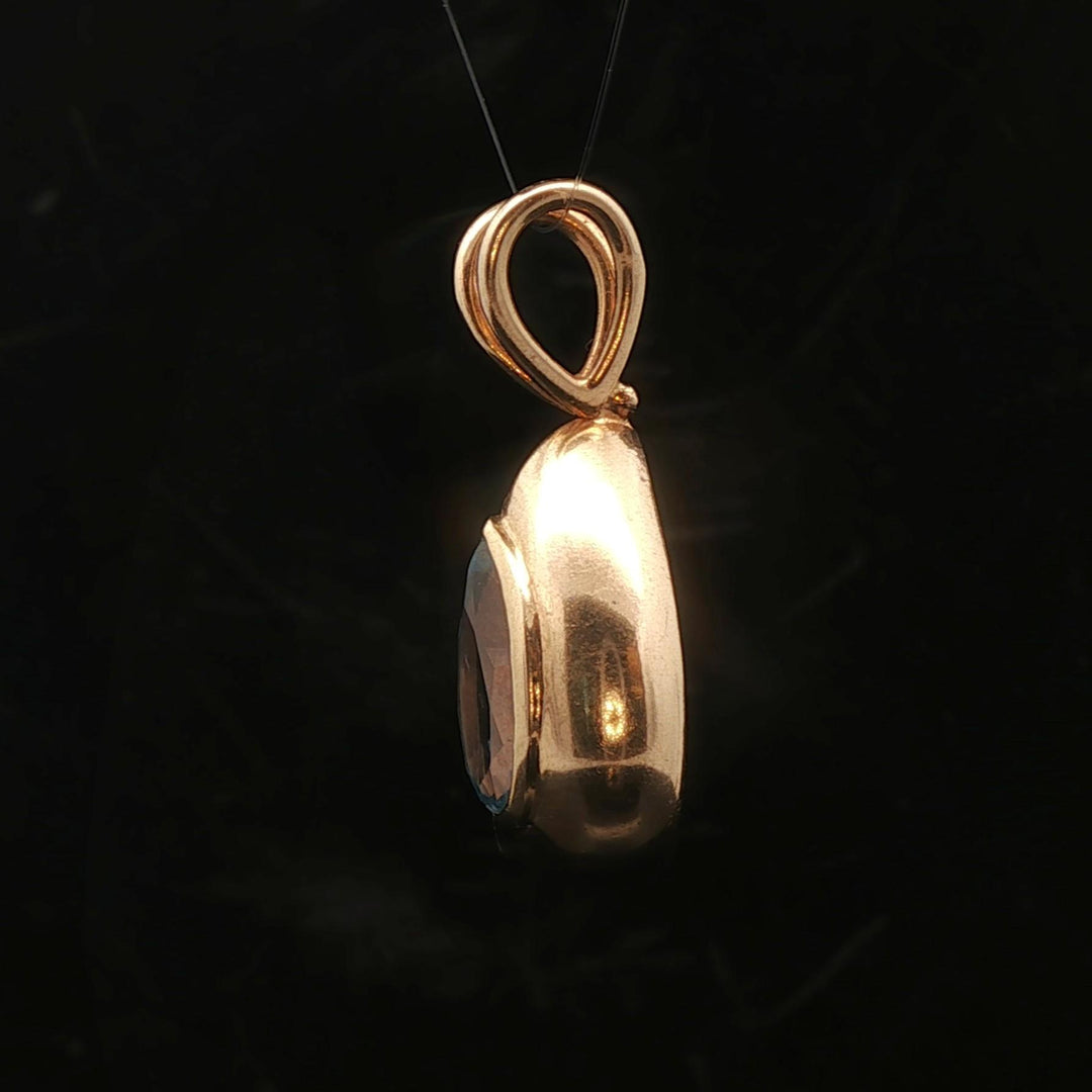 14k Yellow Gold and Pear Cut Blue Topaz 5.2g Pendant 1.2"