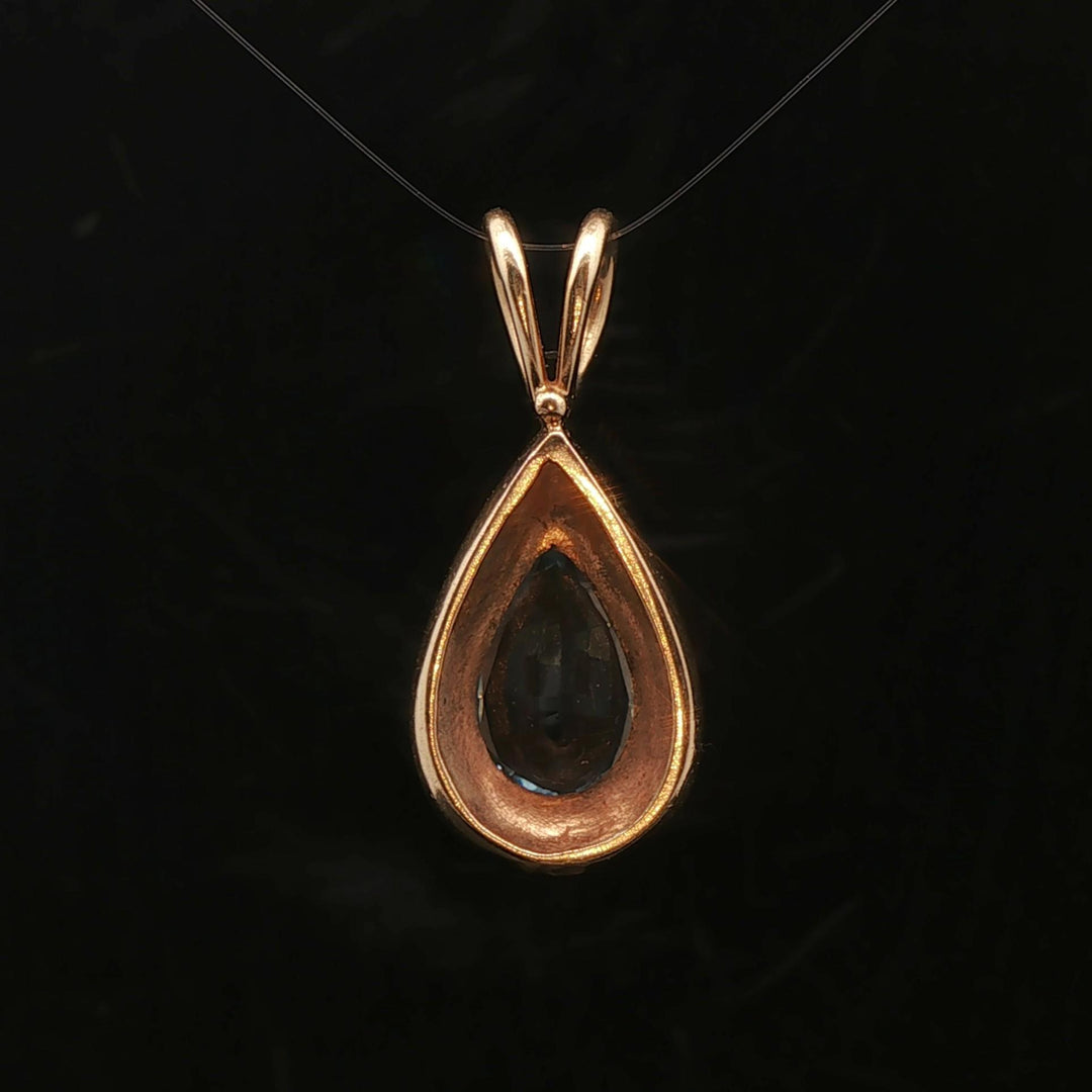 14k Yellow Gold and Pear Cut Blue Topaz 5.2g Pendant 1.2"
