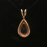 14k Yellow Gold and Pear Cut Blue Topaz 5.2g Pendant 1.2"