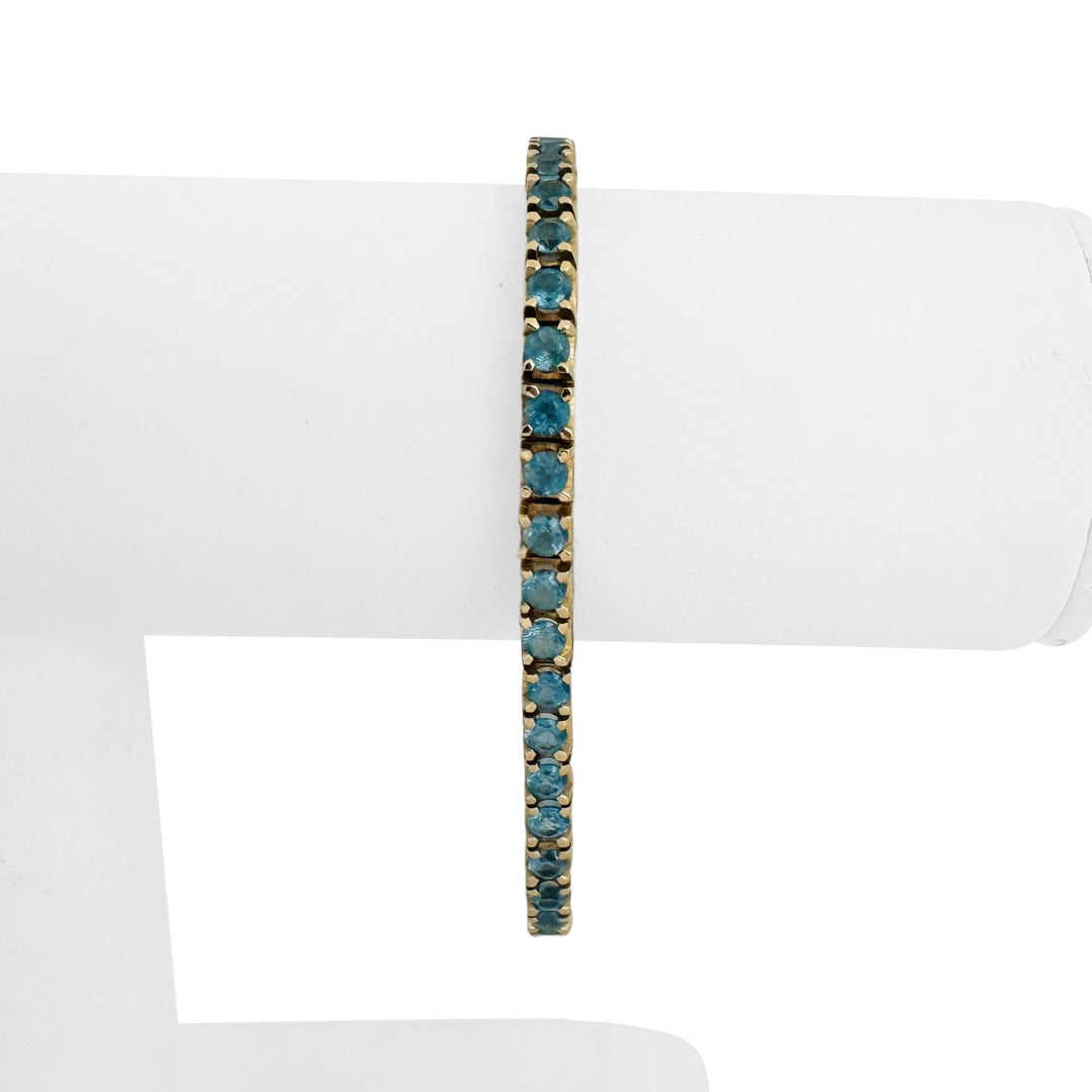 14k Yellow Gold and 7.2cttw Blue Topaz 15.4g Solid Tennis Bracelet Italy 7.25"