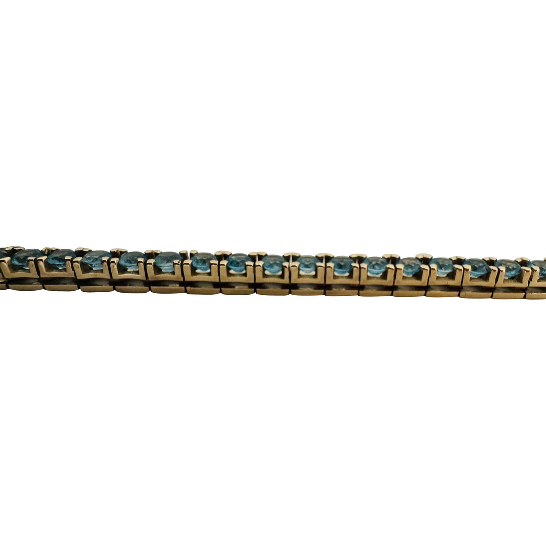 14k Yellow Gold and 7.2cttw Blue Topaz 15.4g Solid Tennis Bracelet Italy 7.25"