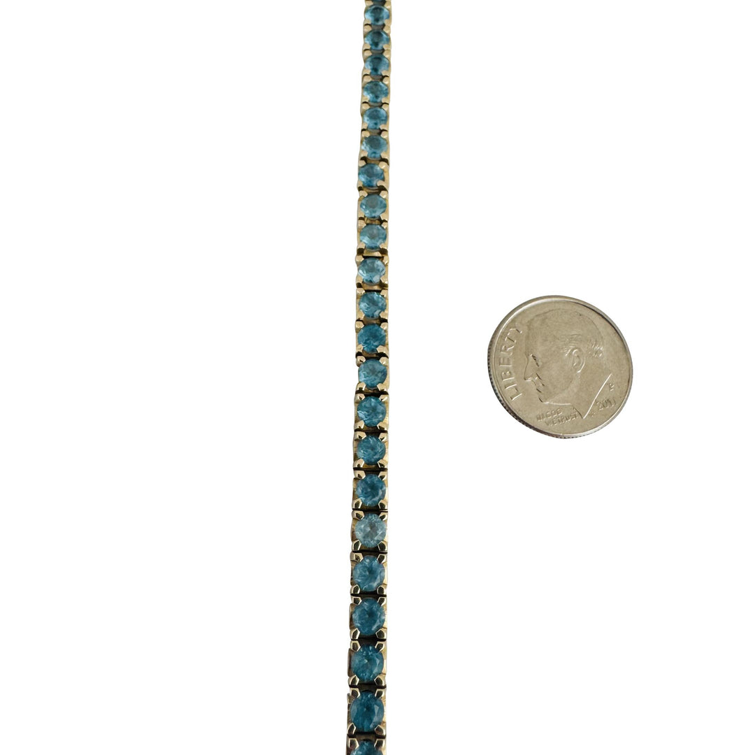 14k Yellow Gold and 7.2cttw Blue Topaz 15.4g Solid Tennis Bracelet Italy 7.25"