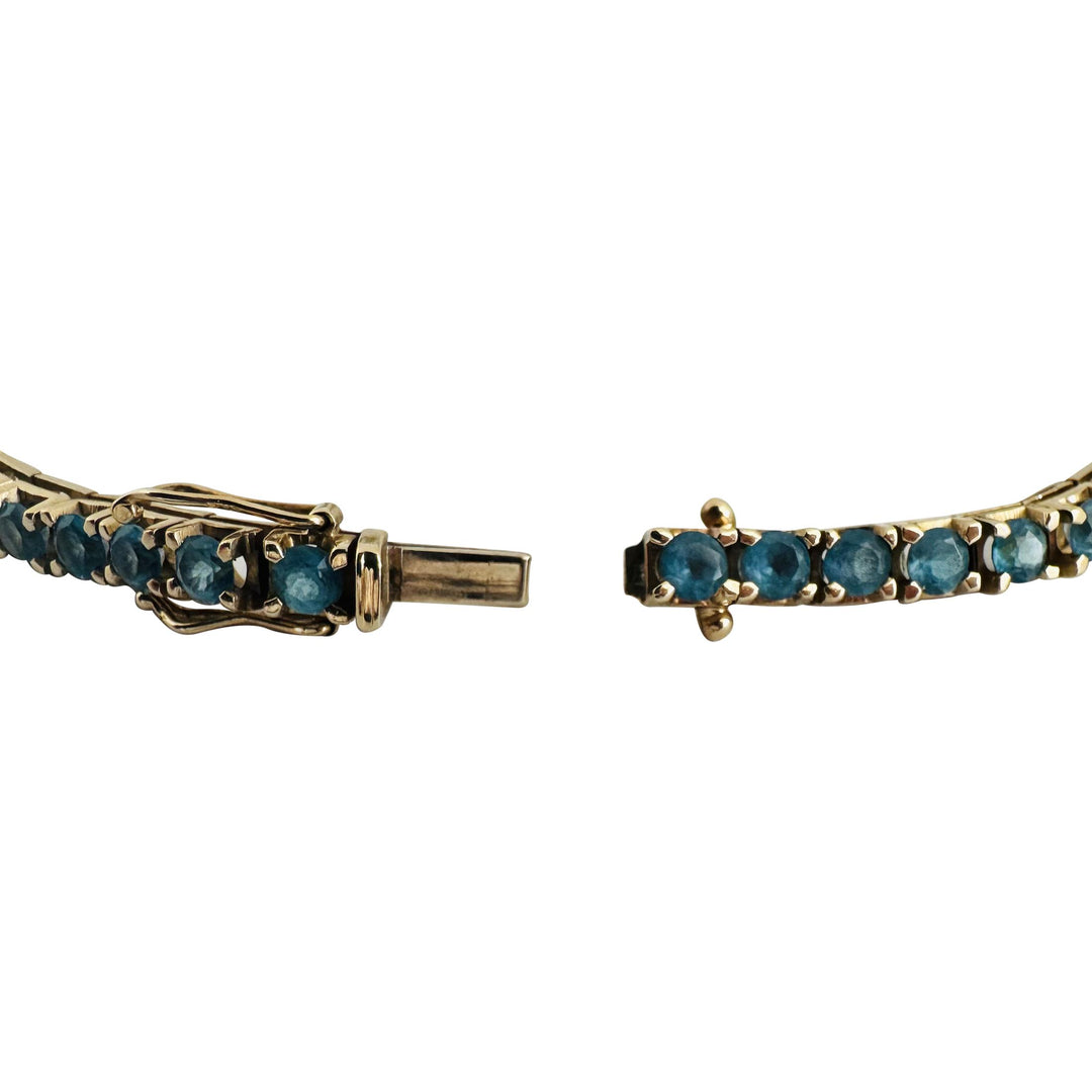 14k Yellow Gold and 7.2cttw Blue Topaz 15.4g Solid Tennis Bracelet Italy 7.25"