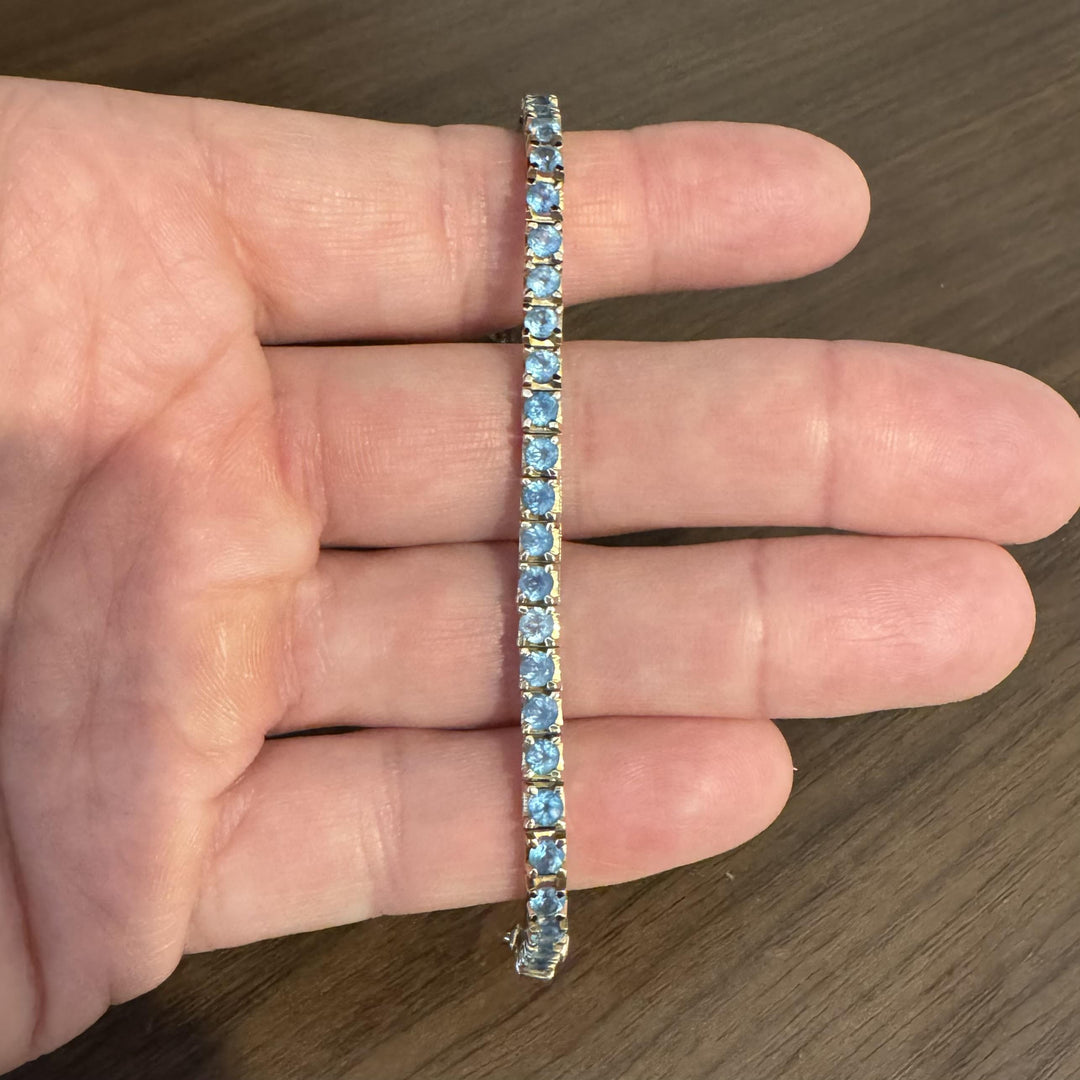14k Yellow Gold and 7.2cttw Blue Topaz 15.4g Solid Tennis Bracelet Italy 7.25"