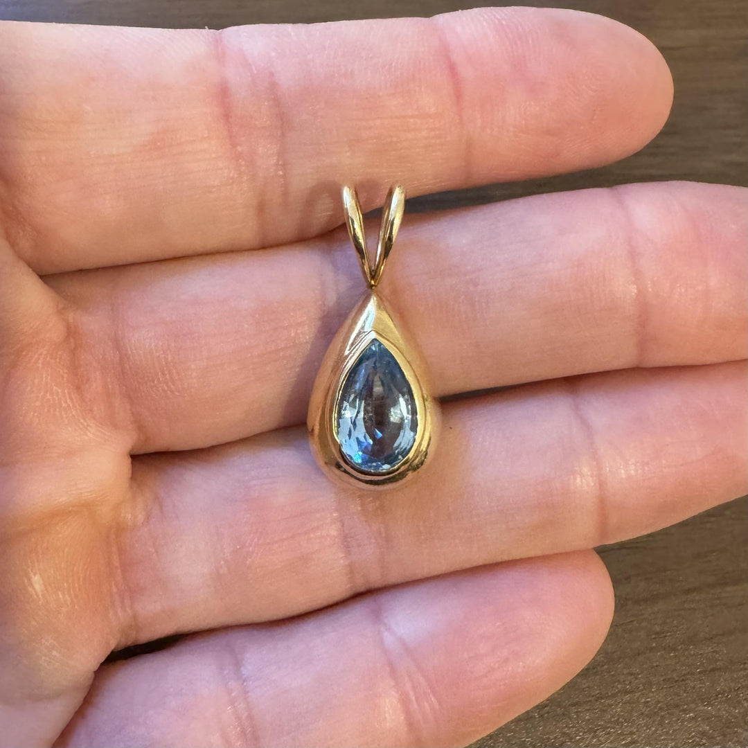 14k Yellow Gold and Pear Cut Blue Topaz 5.2g Pendant 1.2"