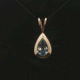 14k Yellow Gold and Pear Cut Blue Topaz 5.2g Pendant 1.2"