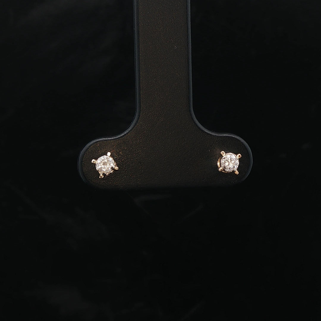 14k Yellow Gold and 0.10cttw Round Cut Diamond Stud Earrings