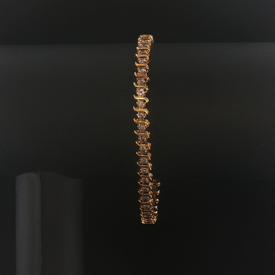 10k Yellow Gold and 2.5cttw Diamond Vintage S Link Tennis Bracelet 7.25"