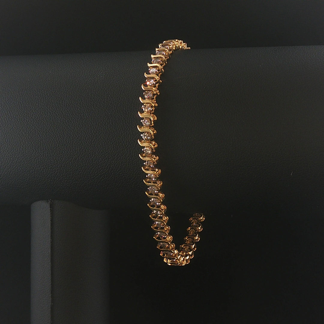 10k Yellow Gold and 2.5cttw Diamond Vintage S Link Tennis Bracelet 7.25"