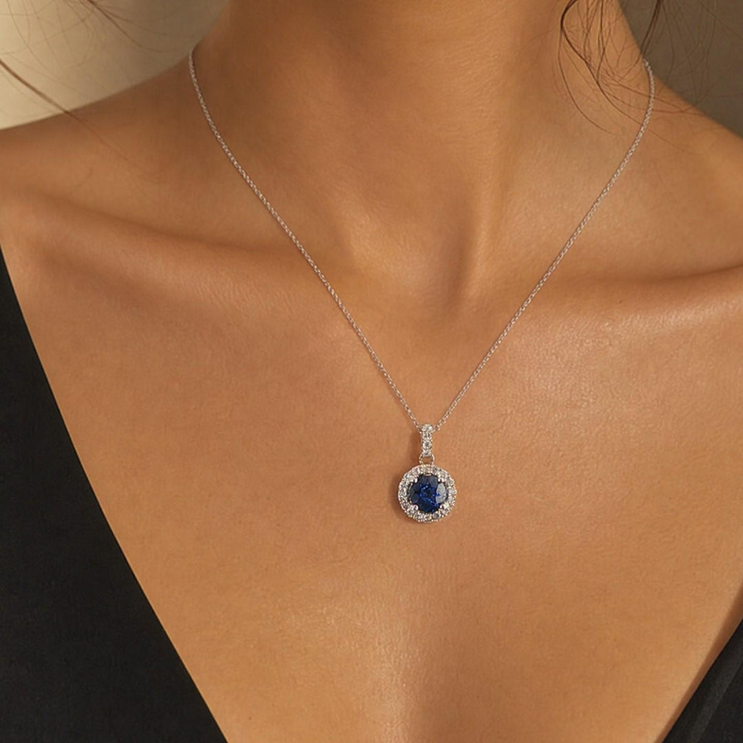 18k White Gold 0.97ct Sapphire and 0.30cttw Diamond Halo Pendant Necklace 16"