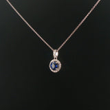 18k White Gold 0.97ct Sapphire and 0.30cttw Diamond Halo Pendant Necklace 16"