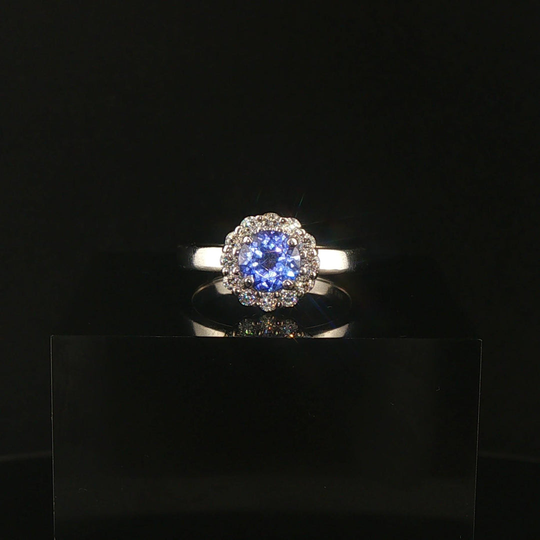 Platinum 0.68cttw Tanzanite and 0.25cttw Diamond Halo Ring Size 6.5