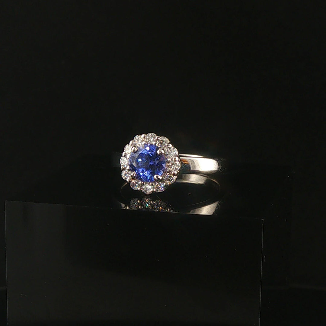 Platinum 0.68cttw Tanzanite and 0.25cttw Diamond Halo Ring Size 6.5