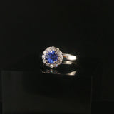 Platinum 0.68cttw Tanzanite and 0.25cttw Diamond Halo Ring Size 6.5