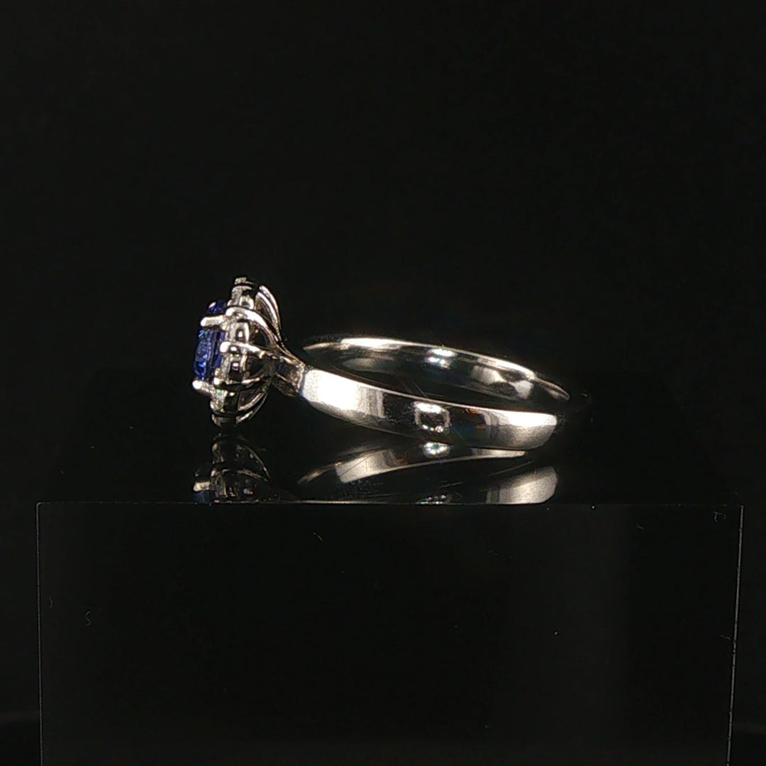Platinum 0.68cttw Tanzanite and 0.25cttw Diamond Halo Ring Size 6.5
