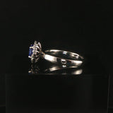 Platinum 0.68cttw Tanzanite and 0.25cttw Diamond Halo Ring Size 6.5