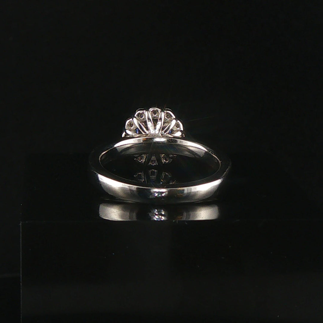 Platinum 0.68cttw Tanzanite and 0.25cttw Diamond Halo Ring Size 6.5