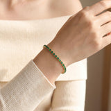 14k Yellow Gold and 1.44cttw Emerald Vintage Tennis Bracelet 6.75"