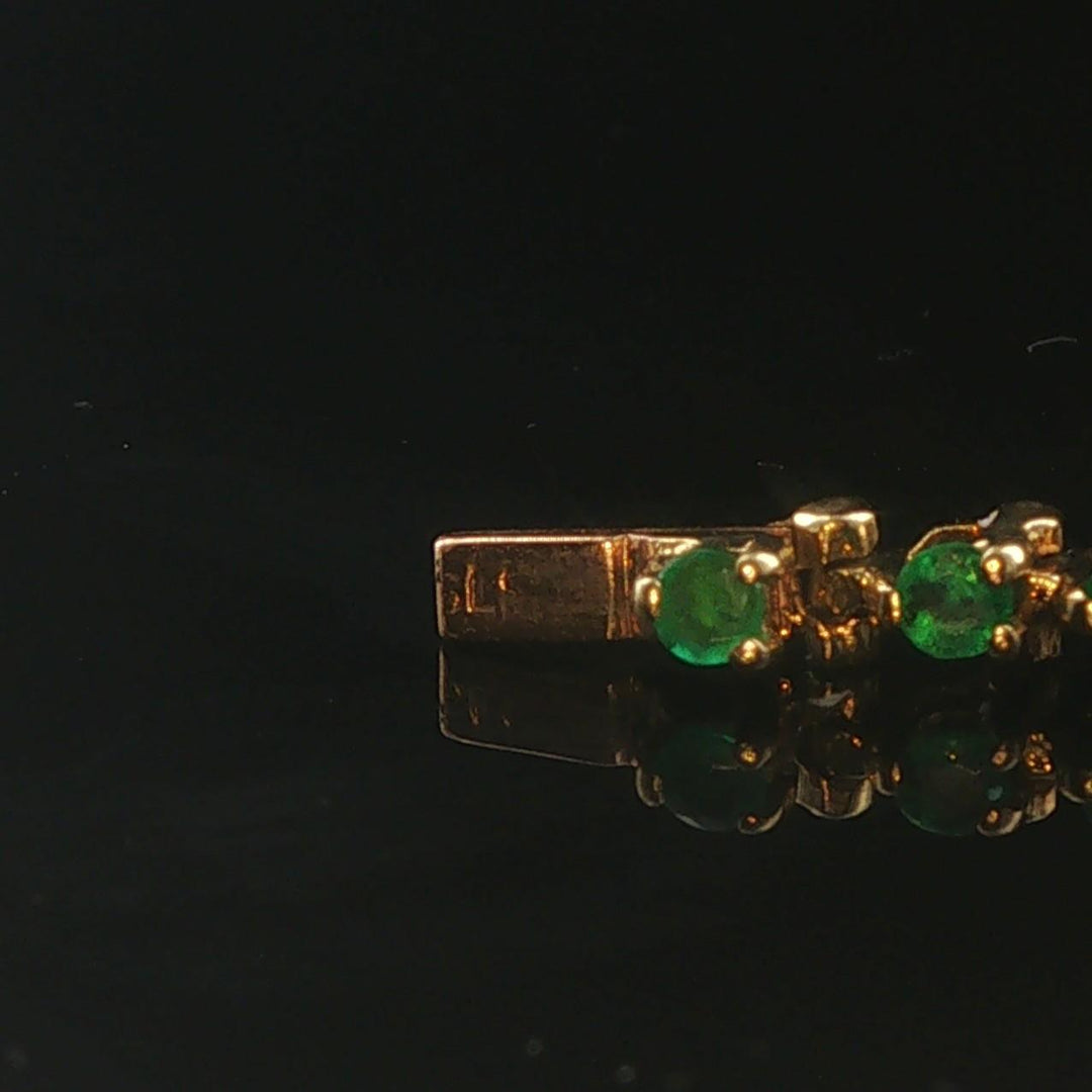 14k Yellow Gold and 1.44cttw Emerald Vintage Tennis Bracelet 6.75"