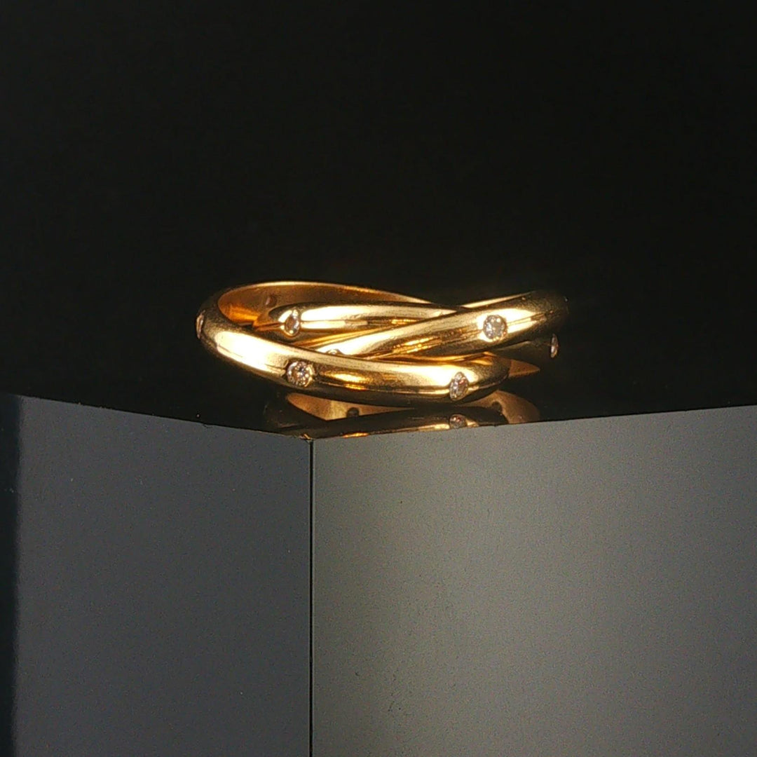 18k Yellow Gold and 0.20cttw Diamond Rolling Bands Ring Size 4.75