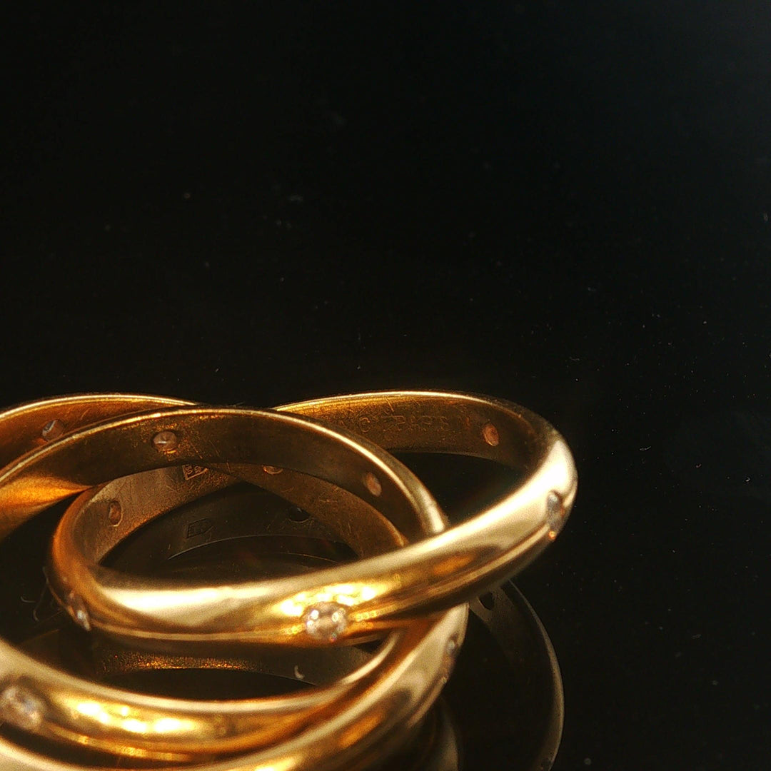 18k Yellow Gold and 0.20cttw Diamond Rolling Bands Ring Size 4.75