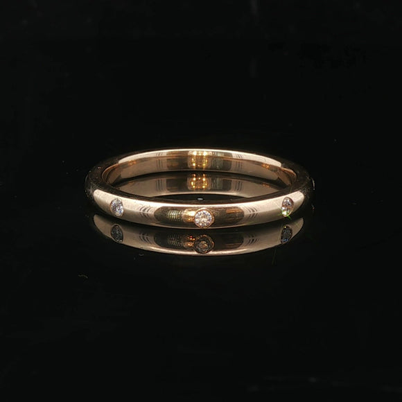 14k Yellow Gold and 0.08cttw Flush Set Diamond 2.5mm Eternity Band Size 7.75