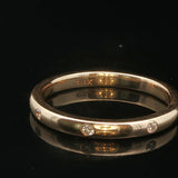 14k Yellow Gold and 0.08cttw Flush Set Diamond 2.5mm Eternity Band Size 7.75