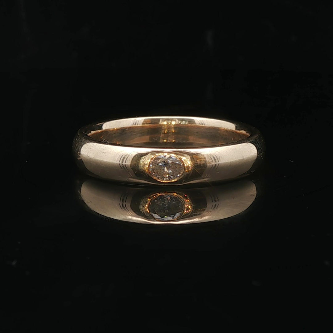 14k Yellow Gold and 0.10ct Flush Set Oval Diamond 4mm Band Size 7.75