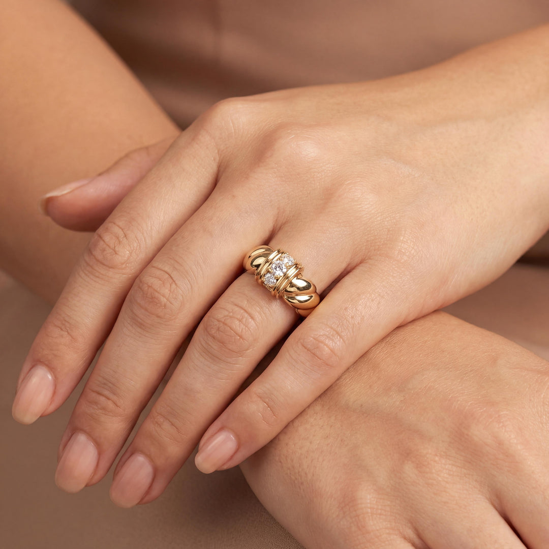 18k Yellow Gold and 0.36cttw Three Diamond Twist Band Ring Size 6