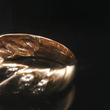 18k Yellow Gold and 0.36cttw Three Diamond Twist Band Ring Size 6