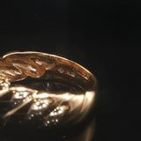 18k Yellow Gold and 0.36cttw Three Diamond Twist Band Ring Size 6