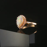 14k Yellow Gold Opal and 0.25cttw Diamond Ladies Halo Ring Size 9.5