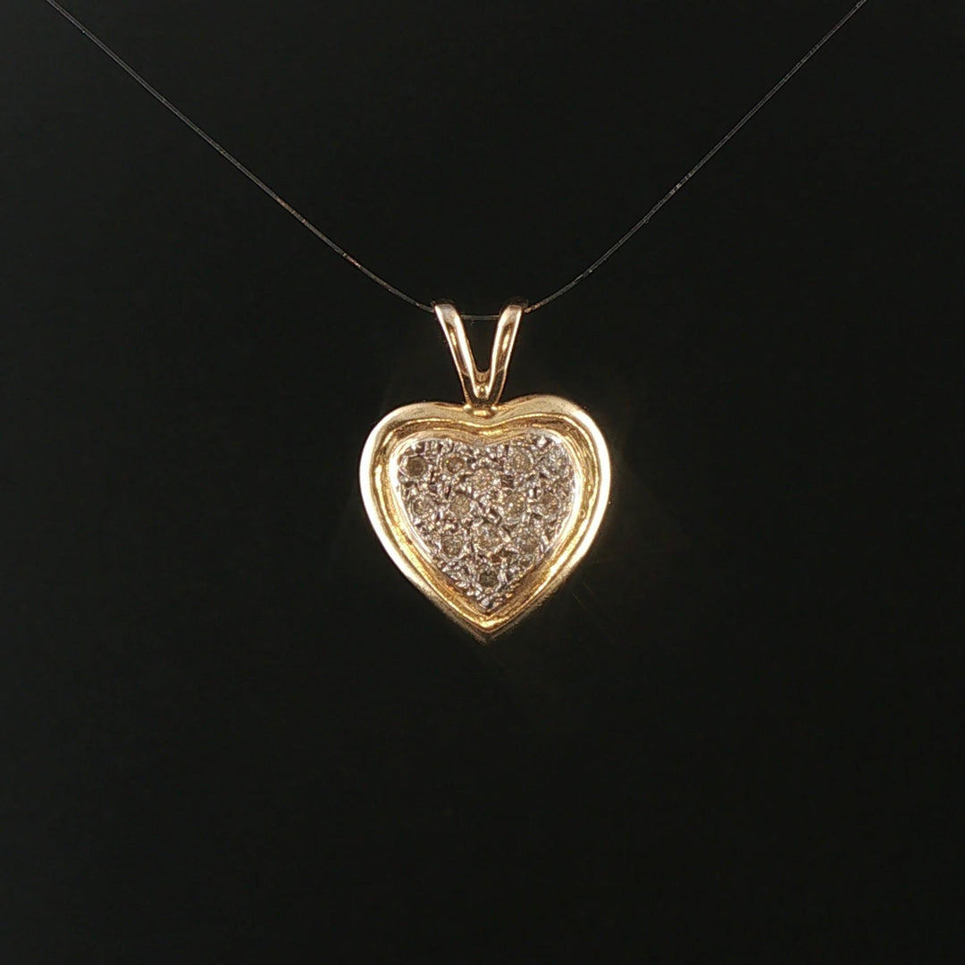 14k Yellow and White Gold 0.25cttw Diamond Vintage Heart Pendant