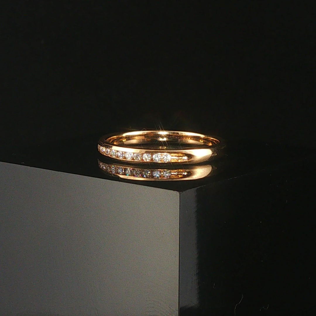 14k Yellow Gold and 0.12cttw Channel Set Diamond Thin Band Ring Size 7