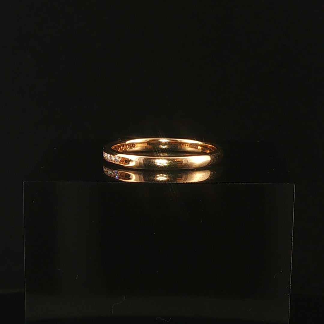 14k Yellow Gold and 0.12cttw Channel Set Diamond Thin Band Ring Size 7