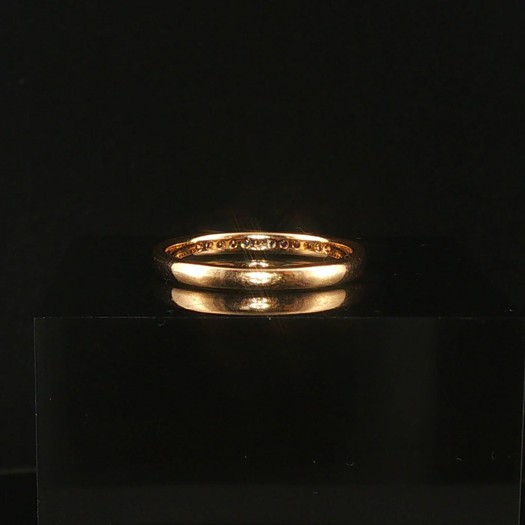 14k Yellow Gold and 0.12cttw Channel Set Diamond Thin Band Ring Size 7