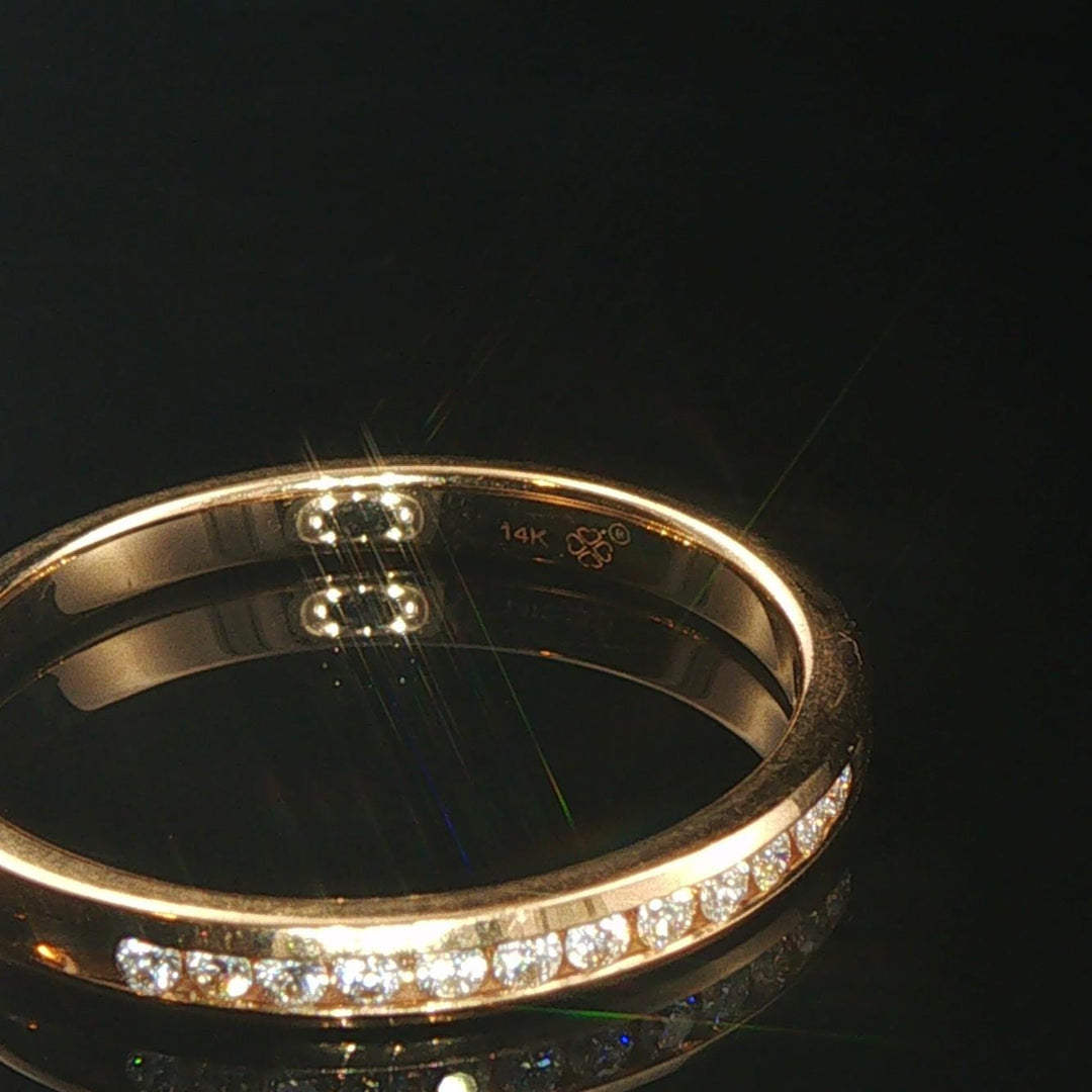 14k Yellow Gold and 0.12cttw Channel Set Diamond Thin Band Ring Size 7