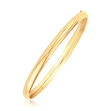 Brand New Classic Bangle in 14k Yellow Gold (5.00 mm)