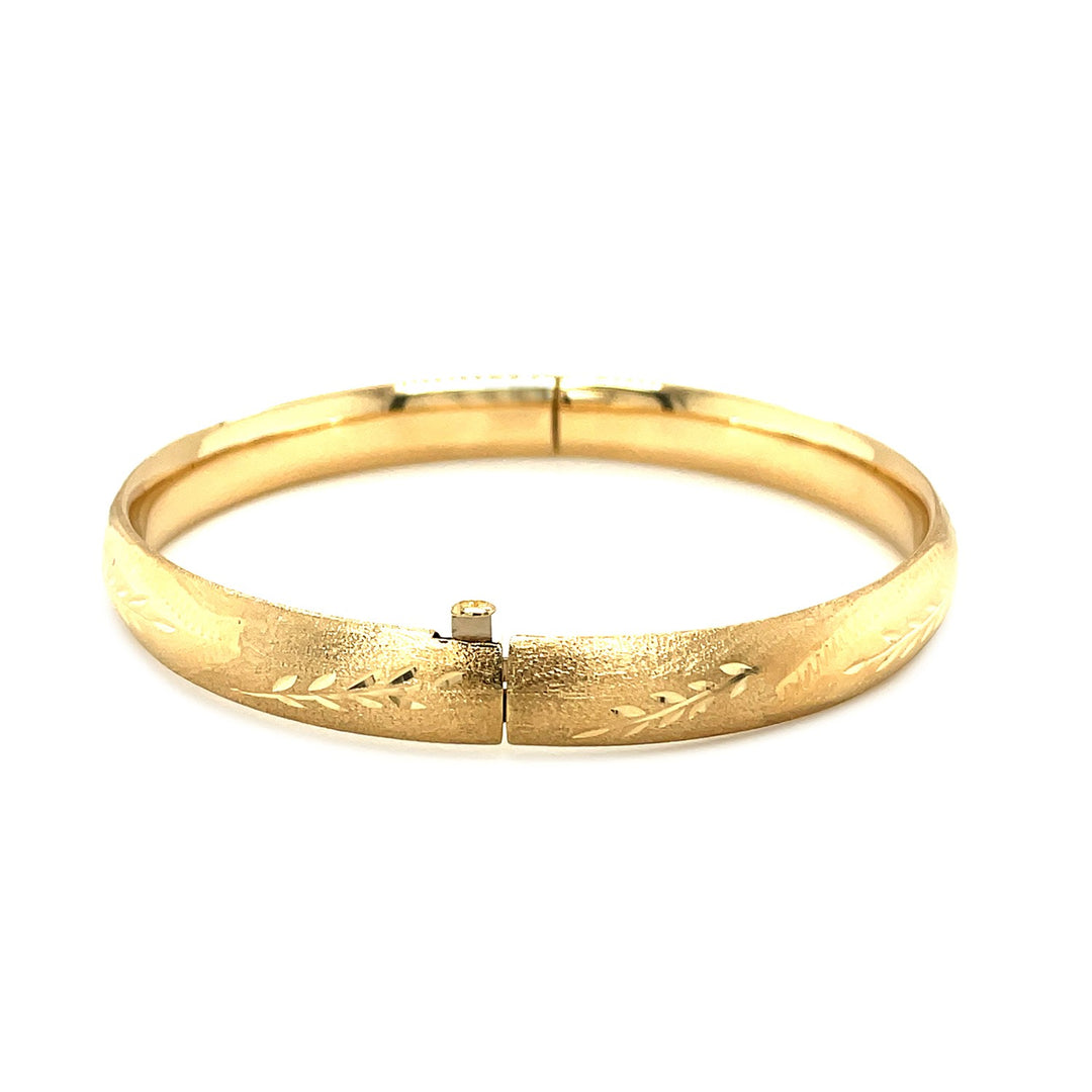 Brand New Classic Floral Carved Bangle in 14k Yellow Gold (8.00 mm)