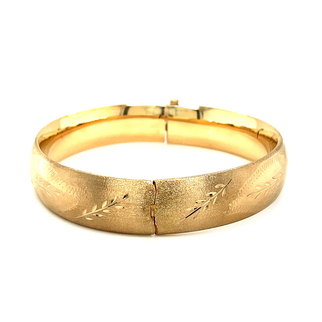 Brand New Classic Floral Carved Bangle in 14k Yellow Gold (13.50 mm)