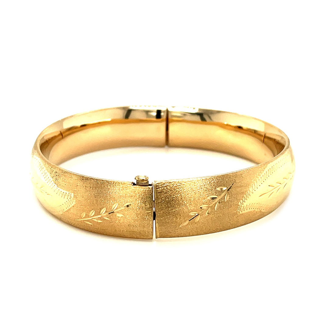 Brand New Classic Floral Carved Bangle in 14k Yellow Gold (13.50 mm)