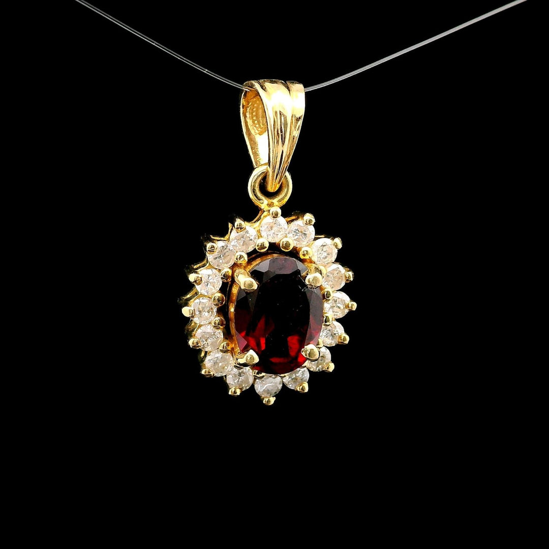 18k Yellow Gold Red Garnet and 0.50cttw Diamond Halo Pendant