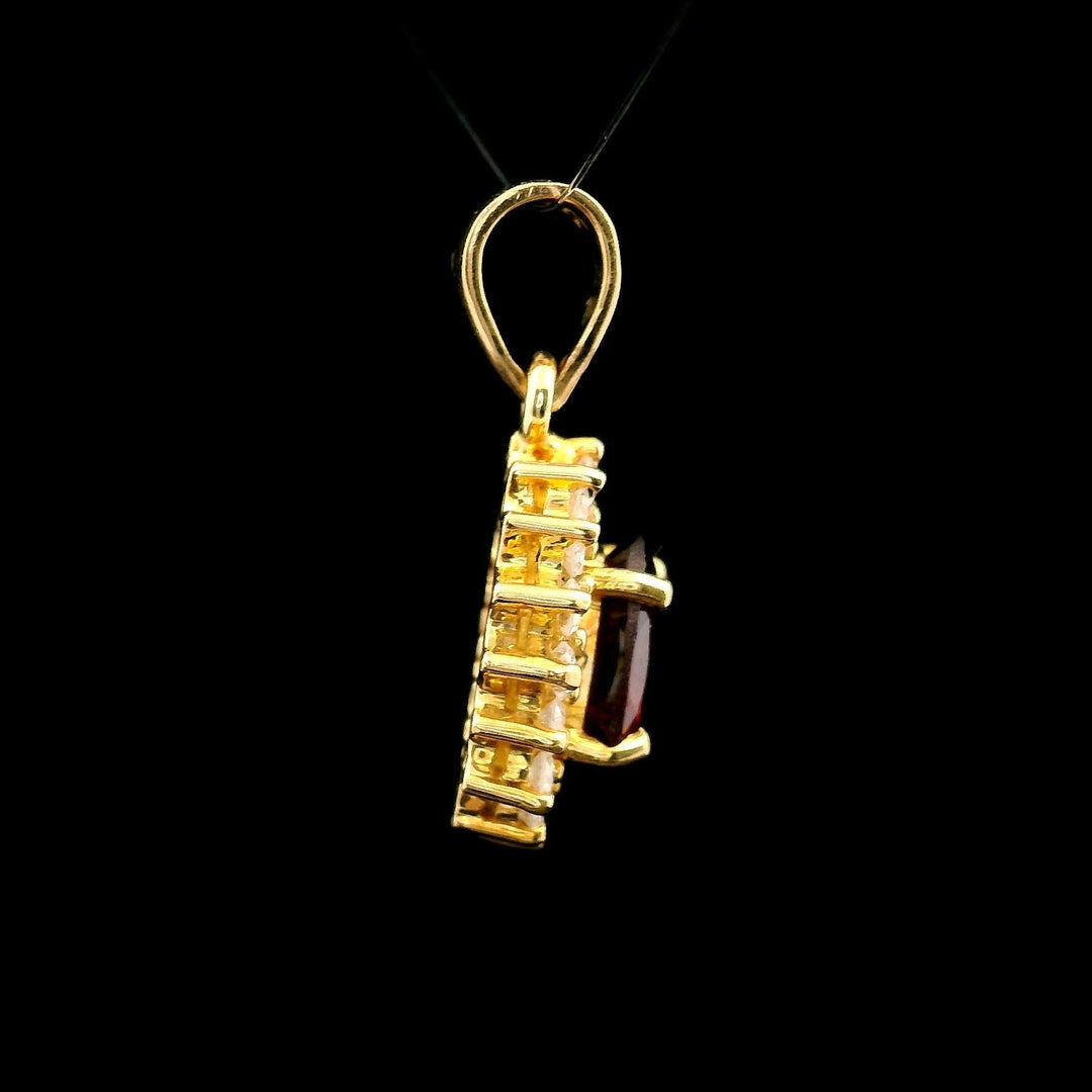 18k Yellow Gold Red Garnet and 0.50cttw Diamond Halo Pendant